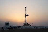 FILE PHOTO: A general view shows an oil rig used in drilling at the Zubair oilfield in Basra, Iraq, July 5, 2022. REUTERS/Essam Al-Sudani/File Photo