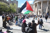 Several hundred students and pro-Palestinian supporters rally at the intersection in front of Woolsey Hall on the campus of Yale University, in New Haven, Conn. April 22, 2024. (Ned Gerard/Hearst Connecticut Media via AP)