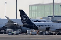 FILE PHOTO: Lufthansa's aircrafts are seen on the tarmac at the Munich International Airport, Germany, February 16, 2023. REUTERS/Leonhard Simon/File Photo