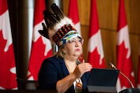 Manitoba Regional Chief Cindy Woodhouse of the Assembly of First Nations speaks during a press conference on a revised final settlement agreement to compensate First Nations children and families in Ottawa, on Wednesday, April 5, 2023. THE CANADIAN PRESS/Spencer Colby