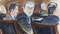 FILE - In this courtroom sketch from federal court in New York, Tuesday, Feb. 20, 2024, former Honduran President Juan Orlando Hernández, seated center at the defense table, turns to looks at prospective jurors during the jury selection process at the start of his trial. Hernández has been convicted in New York, Friday, March 8, of charges that he conspired with drug traffickers, his military and police to enable tons of cocaine to make it unhindered into the United States. (Elizabeth Williams via AP, File)