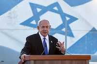 Israel's Prime Minister Benjamin Netanyahu delivers a speech near the city of Rishon LeZion on July 5.
