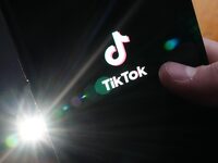 TikTok is testing an app that rivals Instagram in Canada. The TikTok startup page is displayed on an iPhone in Ottawa, Monday, Feb. 27, 2023. THE CANADIAN PRESS/Sean Kilpatrick
