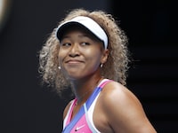 FILE - Naomi Osaka of Japan smiles during her first round match against Camila Osorio of Colombia at the Australian Open tennis championships in Melbourne, Australia, Monday, Jan. 17, 2022. Naomi Osaka is pregnant and plans to return to competition in 2024, the tennis star announced Wednesday, Jan. 11, 2023. The former world No. 1 posted a life update Wednesday on social media, including a picture of an ultrasound. (AP Photo/Simon Baker, File)