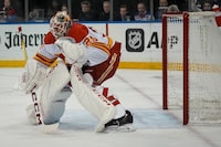 The Calgary Flames have listed goaltender Jacob Markstrom as day-to-day with a lower-body injury. Markstrom (25) minds the net during second period NHL hockey against the New York Rangers, in New York, Monday, Feb. 12, 2024. THE CANADIAN PRESS/AP-Bryan Woolston