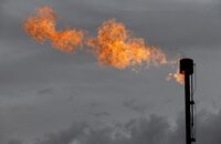 FILE PHOTO: A flare burns off excess gas from a gas plant in the Permian Basin in Loving County, Texas, U.S., November 25, 2019.REUTERS/Angus Mordant/File Photo