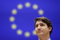 Canadian Prime Minister Justin Trudeau addresses European lawmakers ahead of a NATO summit and G7 meeting, amid Russia's invasion of Ukraine, in Brussels, Belgium, March 23, 2022. REUTERS/Johanna Geron