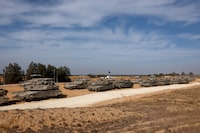 Israeli tanks are parked near the Israel-Gaza border, amid the ongoing conflict between Israel and the Palestinian Islamist group Hamas, in Israel, May 2, 2024. REUTERS/Amir Cohen     TPX IMAGES OF THE DAY