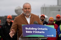 Ontario Energy Minister Todd Smith addresses a news conference at the Pickering Nuclear Generating Station in Pickering, Ont. on Tuesday, Jan.30, 2024. Smith has introduced legislation to overturn a decision on natural gas connections by the province's independent energy regulator.THE CANADIAN PRESS/Frank Gunn