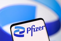 FILE PHOTO: Pfizer logo is seen in this illustration taken, May 1, 2022. REUTERS/Dado Ruvic/Illustration/File Photo