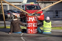 Climate activists block airport near St Gallen, Altenrhein, Switzerland January 16, 2023.Debt for Climate Switzerland/Handout via REUTERS    THIS IMAGE HAS BEEN SUPPLIED BY A THIRD PARTY. NO RESALES. NO ARCHIVES. MANDATORY CREDIT