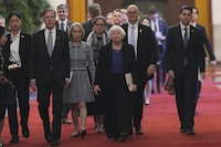 U.S. Treasury Secretary Janet Yellen, center, walks near U.S. Ambassador to China Nicholas Burns, third from left, to a meeting with Chinese Premier Li Qiang, unseen, at the Great Hall of the People in Beijing, China, Sunday, April 7, 2024. Yellen, who arrived later in Beijing after starting her five-day visit in one of China's major industrial and export hubs, said the talks would create a structure to hear each other's views and try to address American concerns about manufacturing overcapacity in China. (AP Photo/Tatan Syuflana, Pool)