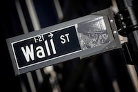 A street sign for Wall Street is seen in the financial district in New York on Nov. 8, 2021.