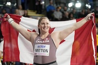 Sarah Mitton, of Canada, poses after winning the gold medal in the women's shot put during the World Athletics Indoor Championships at the Emirates Arena in Glasgow, Scotland, Friday, March 1, 2024. (AP Photo/Bernat Armangue)