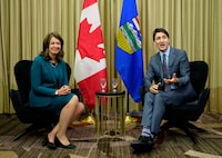 Prime Minister Justin Trudeau meets with Alberta Premier Danielle Smith in Calgary on Wednesday, March 13, 2024. THE CANADIAN PRESS/Todd Korol