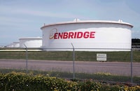 This June 29, 2018 photo shows tanks at the Enbridge Energy terminal in Superior,&nbsp;Wisconsin.&nbsp;A U.S. judge has ordered Enbridge Inc. to pay an Indigenous band in Wisconsin US$5.1 million and to remove the Line 5 pipeline from its property within three years.&nbsp;THE CANADIAN PRESS/AP-Jim Mone