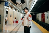 Ethan Colangelo poses for a photo in the subway station near his home, Friday, July 21, 2023. Colangelo recently relocated from New York back to Toronto, where he grew up, for his position as the National Ballet’s new choreographic associate. (Galit Rodan/The Globe and Mail)

