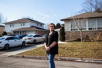 Michelle Gauthier in front of one of many rooming houses in her neighbourhood of Peel Village in Brampton on February 23, 2024. Gauthier says that many of the rooming houses have up to 8 cars per home parked in the driveway and on the street. Many of her neighbours are afraid to walk outside now because of car street races by the tenants in the rooming houses, among other complaints made by homeowners in the area.