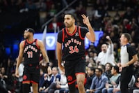 Toronto Raptors' Jontay Porter (34) celebrates after scoring a three pointer, during first half NBA basketball action against the Chicago Bulls, in Toronto on Thursday, January 18, 2024. The Alcohol and Gaming Commission of Ontario says it's closely monitoring an investigation of Raptors backup centre Porter.THE CANADIAN PRESS/Christopher Katsarov