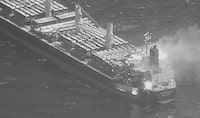 FILE - This black-and-white image released by the U.S. military's Central Command shows the fire aboard the bulk carrier True Confidence after a missile attack by Yemen's Houthi rebels in the Gulf of Aden on Wednesday, March 6, 2024. The longer the war in Gaza goes on and Yemen’s Houthi rebels keep attacking ships in the Red Sea the greater the risk that Yemen could be propelled back into war, the U.N. special envoy for the poorest Arab nation warned Thursday, March 14, 2024. (U.S. Central Command via AP, File)