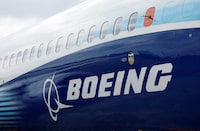 FILE PHOTO: The Boeing logo is seen at the Farnborough International Airshow, in Farnborough, Britain, July 20, 2022.  REUTERS/Peter Cziborra//File Photo