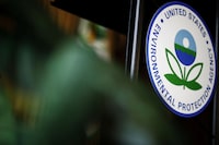 FILE PHOTO: The U.S. Environmental Protection Agency (EPA) sign is seen on the podium at EPA headquarters in Washington, U.S., July 11, 2018. REUTERS/Ting Shen/File Photo