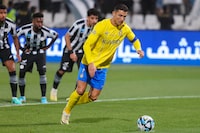 Nassr's Portuguese forward #07 Cristiano Ronaldo takes a penalty kick to score his team's first goal during the Saudi Pro League football match between Al-Shabab and Al-Nassr at the Al-Shabab Club Stadium in Riyadh on February 25, 2024. (Photo by Fayez NURELDINE / AFP) (Photo by FAYEZ NURELDINE/AFP via Getty Images)