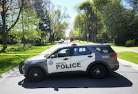 Toronto Police investigate a crime scene outside the mansion of Canadian rap mogul Drake in Toronto's Bridle Path neighbourhood on Tuesday, May 7, 2024. Police allege a man accused of trespassing at Drake's Toronto home earlier this week returned to the property Saturday to retrieve his bike. THE CANADIAN PRESS/Nathan Denette