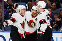 Ottawa Senators right wing Claude Giroux, center, celebrates his goal against the Buffalo Sabres with left wing Tim Stutzle (18) and left wing Brady Tkachuk (7) during the second period of an NHL hockey game Thursday, April 13, 2023, in Buffalo, N.Y. The Senators are missing the playoffs for a sixth straight year, but unlike years past there’s a belief this will be the last time for the foreseeable future. THE CANADIAN PRESS/AP-Jeffrey T. Barnes