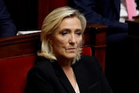 FILE PHOTO: Marine Le Pen, member of parliament and president of the French far-right National Rally (Rassemblement National - RN) party parliamentary group, attends the questions to the government session at the National Assembly in Paris, France, October 10, 2023. REUTERS/Gonzalo Fuentes/File Photo