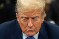 Former U.S. President Donald Trump sits in the courtroom at Manhattan criminal court in New York, U.S., on Friday, April 26, 2024. Trump faces 34 felony counts of falsifying business records as part of an alleged scheme to silence claims of extramarital sexual encounters during his 2016 presidential campaign. Photographer: Jeenah Moon/Pool via REUTERS