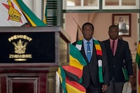 President of Zimbabwe Emmerson Mnangagwa arrives for a press conference at State House in Harare on August 27, 2023. Zimbabwe's President Emmerson Mnangagwa won a second term in office, election officials said Saturday, but the opposition rejected the result of a vote that international observers said fell short of democratic standards. Mnangagwa, 80, won 52.6 percent of the ballots against 44 percent for the main challenger, Nelson Chamisa, 45, according to official results announced by the Zimbabwe Electoral Commission (ZEC). (Photo by Jekesai NJIKIZANA / AFP) (Photo by JEKESAI NJIKIZANA/AFP via Getty Images)