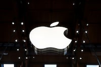 FILE PHOTO: An Apple logo is pictured in an Apple store in Paris, France September 17, 2021. REUTERS/Gonzalo Fuentes/File Photo