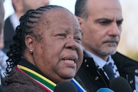 FILE - South Africa's Foreign Minister Naledi Pandor addresses reporters after session of the International Court of Justice, or World Court, in The Hague, Netherlands, Friday, Jan. 26, 2024. South Africa’s foreign minister says her country’s citizens who fight in the Israeli armed forces or alongside them in Gaza will be arrested when they return home. (AP Photo/Patrick Post, File)