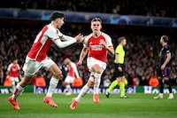 LONDON, ENGLAND - APRIL 09: Leandro Trossard of Arsenal celebrates with teammate Kai Havertz after scoring his team's second goal during the UEFA Champions League quarter-final first leg match between Arsenal FC and FC Bayern München at Emirates Stadium on April 09, 2024 in London, England. (Photo by Shaun Botterill/Getty Images)