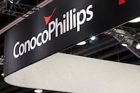 FILE PHOTO: The logo of American oil and natural gas exploration and production company ConocoPhillips is seen during the LNG 2023 energy trade show in Vancouver, British Columbia, Canada, July 12, 2023. REUTERS/Chris Helgren/File Photo
