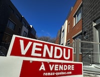 <p>A "sold" sign is shown in a new housing development in Lasalle, a borough of Montreal, Monday, Feb. 19, 2024. The Quebec Professional Association of Real Estate Brokers says Montreal-area home sales rose 14.2 per cent in March compared with the same month last year. THE CANADIAN PRESS/Christinne Muschi</p>