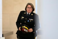 RCMP Commissioner Brenda Lucki  makes her way to the Standing Committee on Public Safety and National Security, in Ottawa, Monday, Oct. 31, 2022. THE CANADIAN PRESS/Adrian Wyld