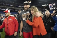 Canadian brands advertising during the Super Bowl are hoping to score with fans of Taylor Swift, who has boosted NFL audiences since she started cheering on her Kansas City-playing boyfriend Travis Kelce at his games. Kelce walks with Swift following the AFC Championship NFL football game between the Baltimore Ravens and the Kansas City Chiefs, Sunday, Jan. 28, 2024, in Baltimore. THE CANADIAN PRESS/AP-Julio Cortez