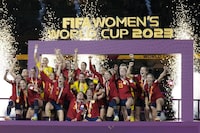 FIOLE - Spain players celebrates after winning the Women's World Cup soccer final against England at Stadium Australia in Sydney, Australia, Sunday, Aug. 20, 2023. The U.S. Soccer Federation and Mexico Football Federation submitted a joint bid to host the 2027 Women’s World Cup, competing against an expected proposal from Brazil and a joint Germany-Netherlands-Belgium plan. (AP Photo/Alessandra Tarantino, File)
