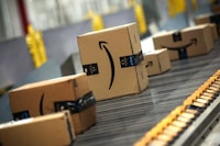 Packages travel on a conveyor during Cyber Monday at the Amazon's fulfillment center in Robbinsville, New Jersey, U.S., November 27, 2023. REUTERS/Mike Segar