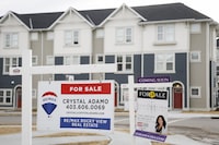 <p>The Calgary Real Estate Board says March home sales were up 9.9 per cent from last year as interprovincial migration to Alberta contributed to tight market conditions. Houses for sale in a new subdivision in Airdrie, Alta., Friday, Jan. 28, 2022. THE CANADIAN PRESS/Jeff McIntosh</p>