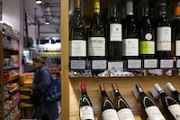 FILE PHOTO: French wines are displayed for sale at Panzer's delicatessen and grocery in London, Britain, March 26, 2024. REUTERS/Toby Melville/File Photo