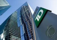 A TD sign on a post outside the TD Terrace building at Front St. West and Simcoe St. in Toronto’s Financial District, is photographed on Mar 4, 2024. (Fred Lum/The Globe and Mail)