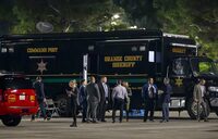 The Orange County aheriff's mobile command post uses the parking lot at Saddleback Church as as staging area in Lake Forest, Calif., Wednesday, Aug. 23, 2023, after a fatal shooting at Cook's Corner in Trabuco Canyon. (Leonard Ortiz/The Orange County Register via AP)