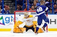 TAMPA, FLORIDA - OCTOBER 10: Brandon Hagel #38 of the Tampa Bay Lightning scores a goal third period during the opening night game against the Nashville Predators at Amalie Arena on October 10, 2023 in Tampa, Florida. (Photo by Mike Ehrmann/Getty Images)