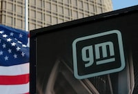 FILE PHOTO: The GM logo is seen on the facade of the General Motors headquarters in Detroit, Michigan, U.S., March 16, 2021. REUTERS/Rebecca Cook/File Photo