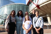 Young Portuguese citizens pose outside the European Court of Human Rights (ECHR) after a hearing in a climate change case involving themselves against 32 countries, in Strasbourg, eastern France, on September 27, 2023. The European Court of Human Rights (ECHR) on September 27, 2023, began hearing a case brought by six Portuguese youths against 32 nations for not doing enough to stop global warming, the latest bid to secure climate justice through the courts. (Photo by Frederick FLORIN / AFP) (Photo by FREDERICK FLORIN/AFP via Getty Images)