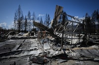 The burned remains of the Scotch Creek-Lee Creek fire department and community hall are seen in Scotch Creek, B.C., on Wednesday, September 6, 2023. British Columbia's forest watchdog has confirmed it is investigating the province's response to wildfires that ripped through small communities on the shores of Shuswap Lake in August, destroying or damaging more than 200 properties.THE CANADIAN PRESS/Darryl Dyck