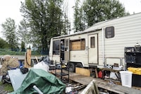 Joy (last name withheld) says for the last six-months she has been at the Lonzo Road encampment near Highway 1 in Abbotsford, B.C., on June 20, 2023. And that she just wants a home to live at. The site is scheduled to be cleared out and replaced with a temporary $4 Million 50-bed shelter which will be built on the site and will be run by the Lookout Housing and Health Society. Jimmy Jeong/The Globe and Mail. 